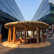 Abdalla Almulla uses palm tree trunks as columns for Dubai Design Week pavilion