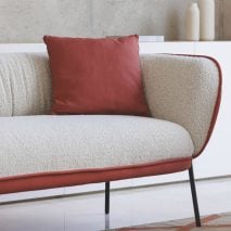 Owwi two-seater sofa with a red cushion by Actiu