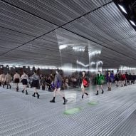 Slime drips from the ceiling at Prada show celebrating "fluid architecture"