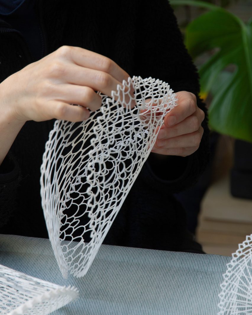 Close up image of someone constructing the volumetric installation
