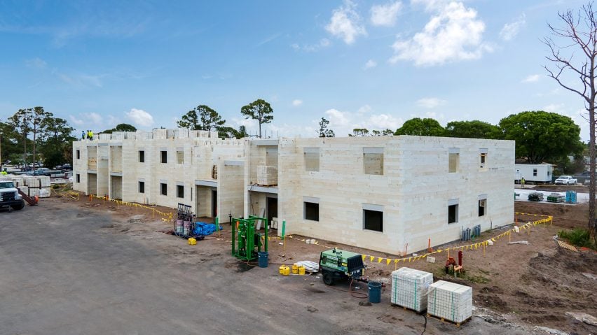 Construction of a building with bricks made of repurposed materials