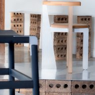 Wooden chair and black stool